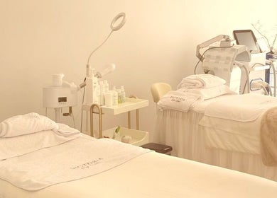 Spa treatment room at Victoria Skin Clinic, Melbourne, Victoria, AU. Features two beds and beauty equipment.