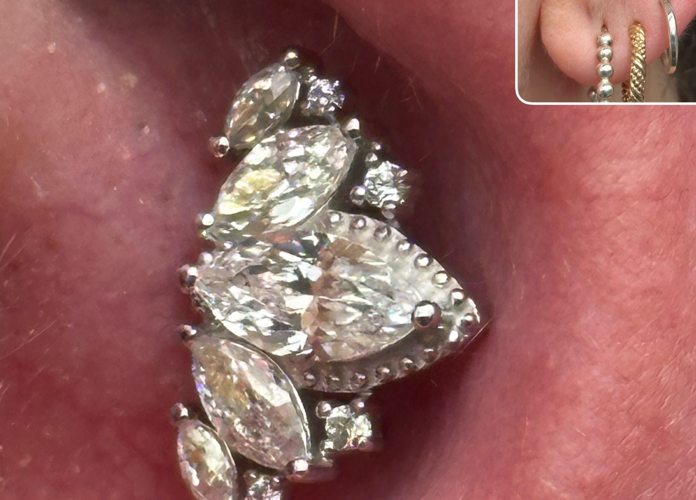 Exquisite diamond ear piercing showcased at The Piercing Co, Bridgend, Wales, GB. Perfect blend of elegance and style.