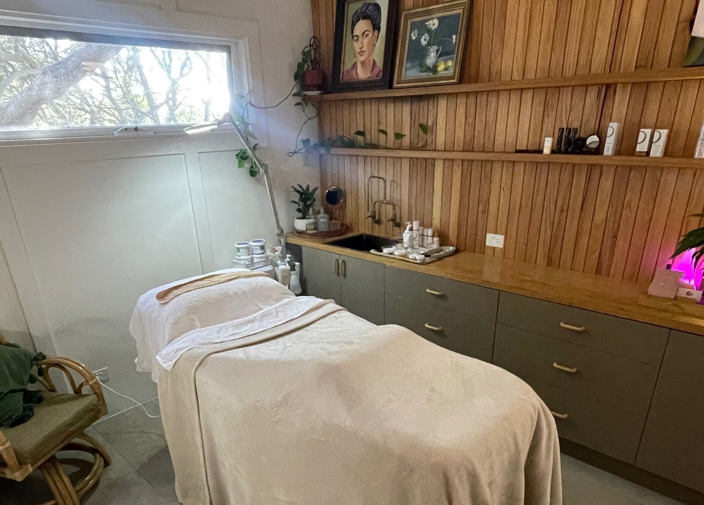 Relaxing treatment room at The Moonah Studio, Blairgowrie, Victoria, AU, with cozy decor and natural light.