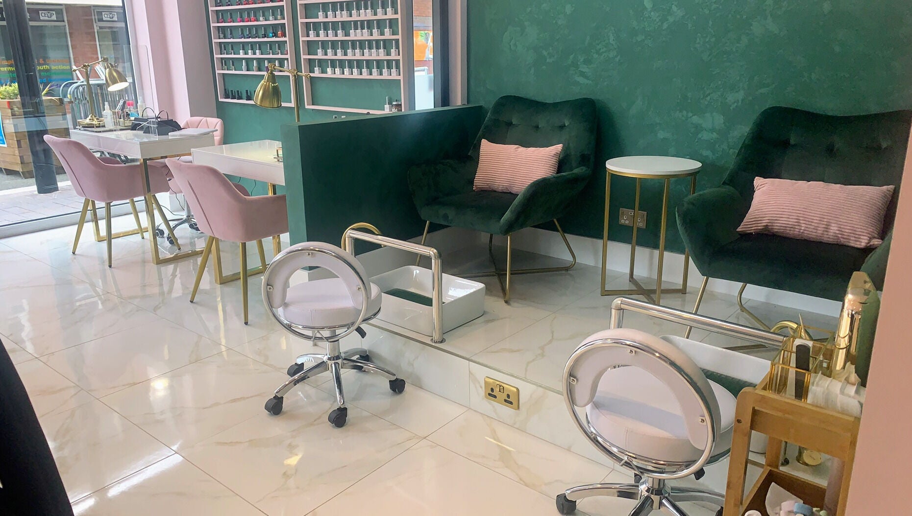 Modern beauty space at Beautie.Lab Aesthetics, London, England, GB, featuring plush chairs and sleek decor.