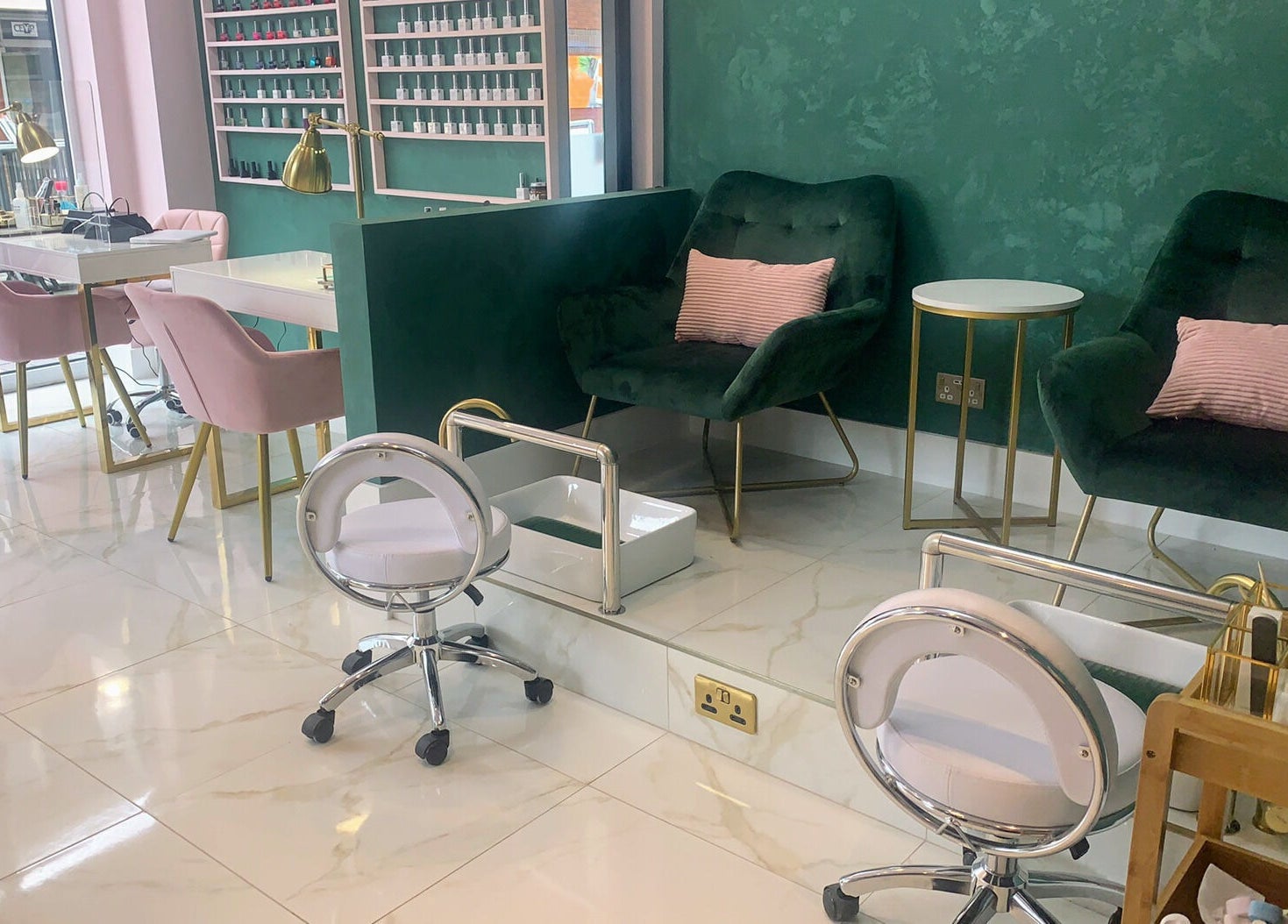 Modern beauty space at Beautie.Lab Aesthetics, London, England, GB, featuring plush chairs and sleek decor.