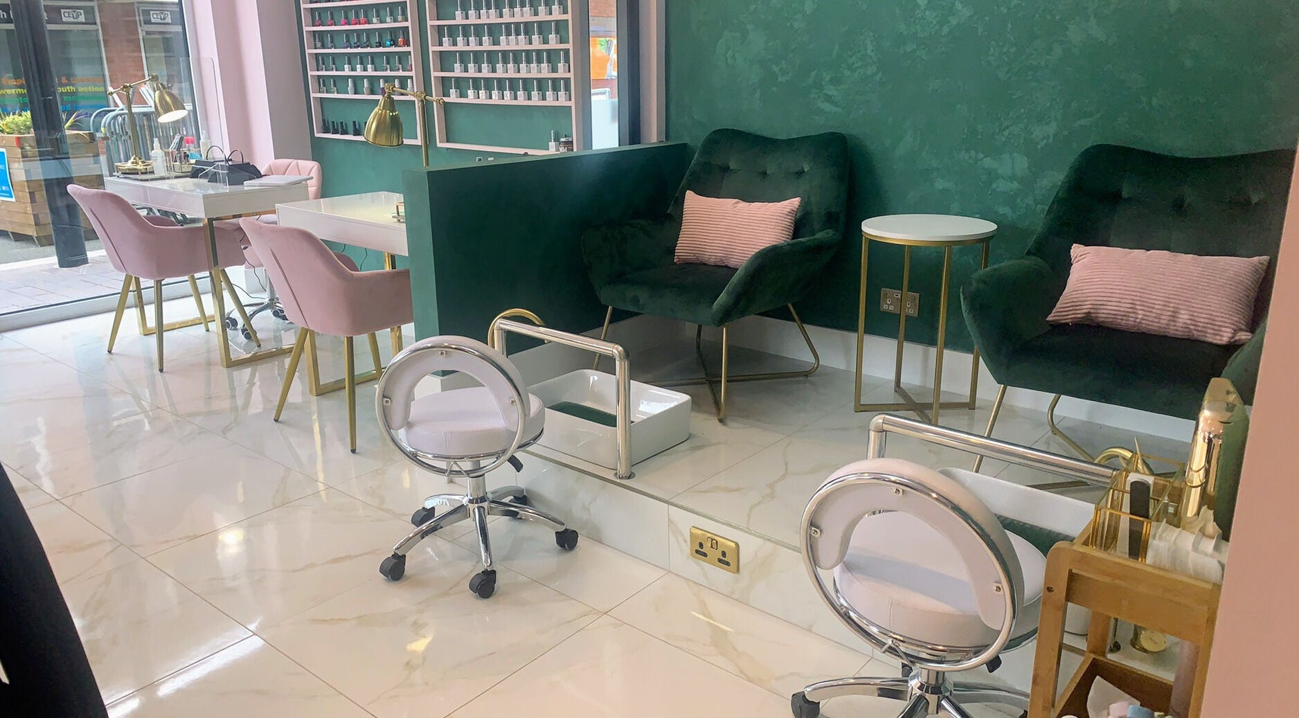 Modern beauty space at Beautie.Lab Aesthetics, London, England, GB, featuring plush chairs and sleek decor.