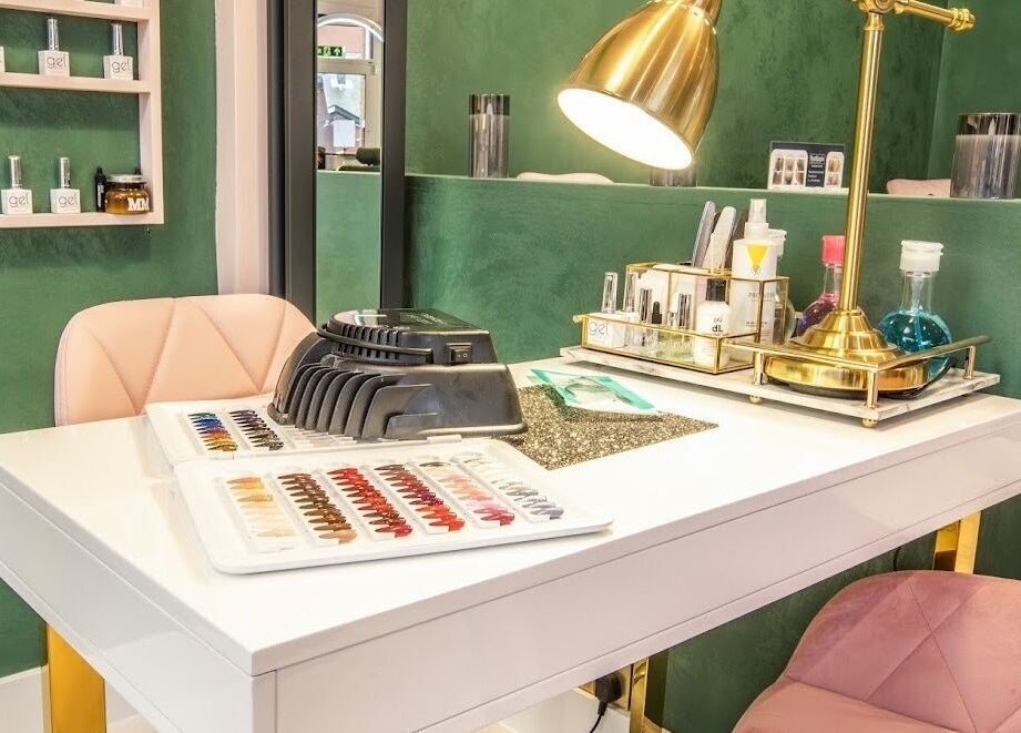 Chic nail station at Beautie.Lab Aesthetics, London, England, GB. Features luxury decor and nail polish selection.