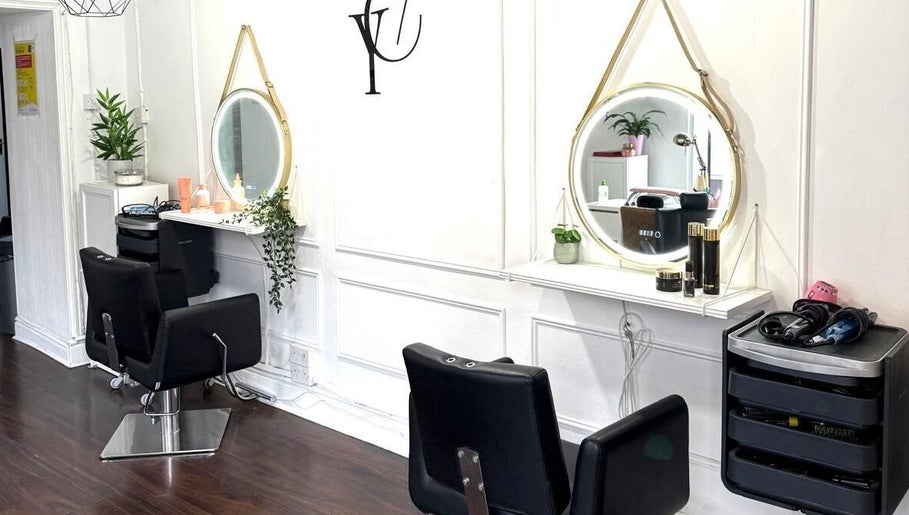 Stylish salon interior at You Concept in Dublin, County Dublin, IE with modern chairs and elegant mirrors.
