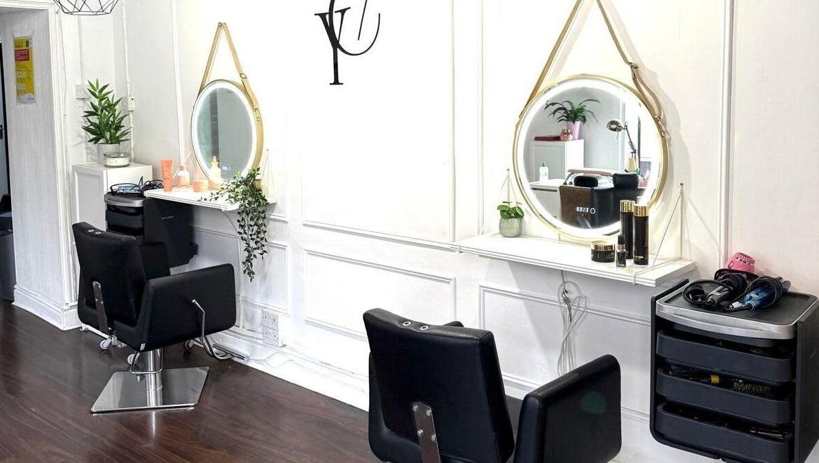 Stylish salon interior at You Concept in Dublin, County Dublin, IE with modern chairs and elegant mirrors.