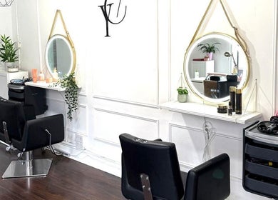 Stylish salon interior at You Concept in Dublin, County Dublin, IE with modern chairs and elegant mirrors.