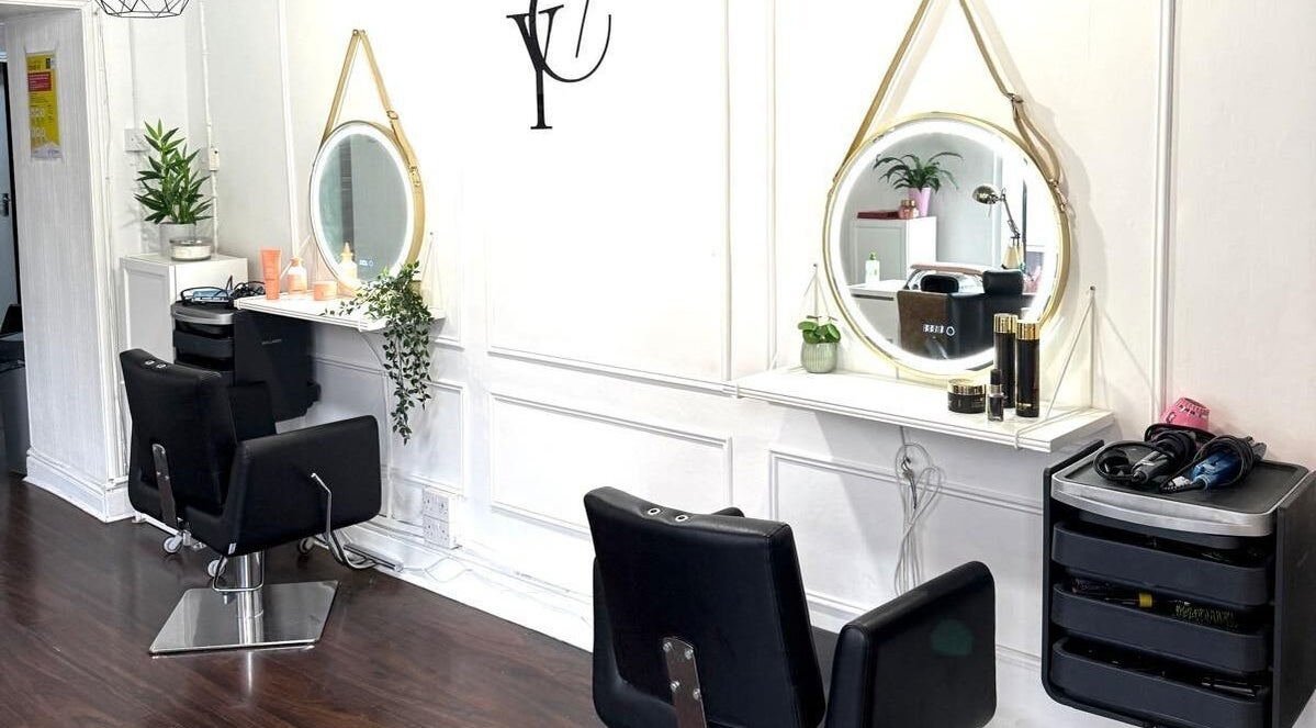 Stylish salon interior at You Concept in Dublin, County Dublin, IE with modern chairs and elegant mirrors.