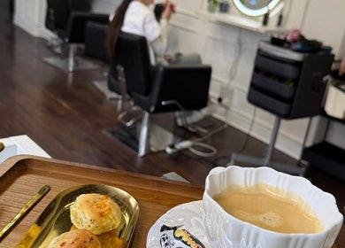 Relaxing atmosphere at You Concept in Dublin with fresh scones and coffee in a chic salon setting.