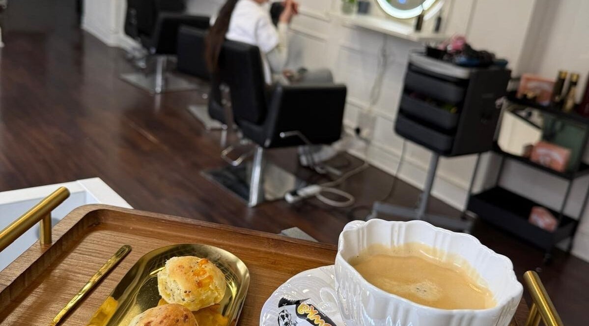 Relaxing atmosphere at You Concept in Dublin with fresh scones and coffee in a chic salon setting.