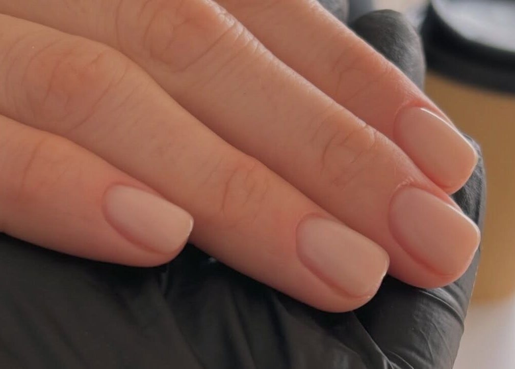 Elegant nude manicure by Beckie Wilson Manicurist in Howden, England, GB, showcasing expert nail care.