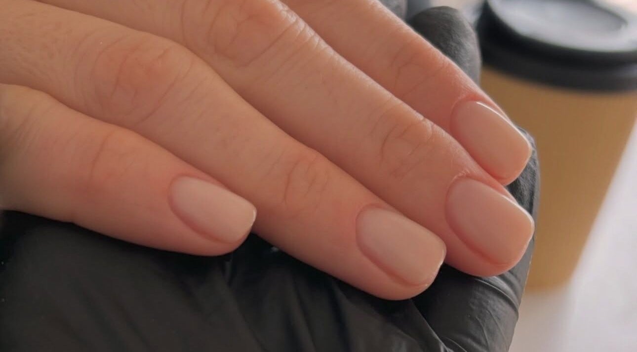 Elegant nude manicure by Beckie Wilson Manicurist in Howden, England, GB, showcasing expert nail care.