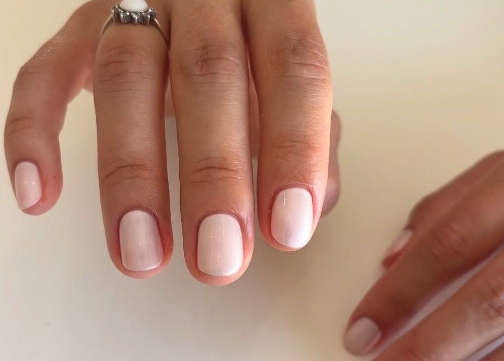 Elegant manicure by Beckie Wilson Manicurist at Howden, England, GB, showcasing glossy nude nails.