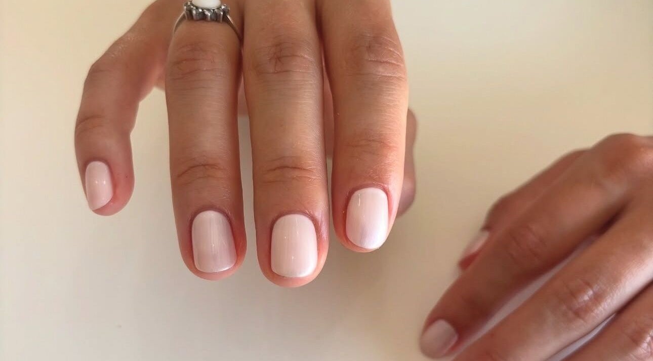 Elegant manicure by Beckie Wilson Manicurist at Howden, England, GB, showcasing glossy nude nails.