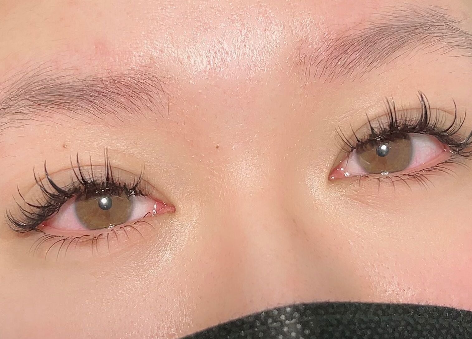 Close-up of eyelash extensions at Min Beauty, Auckland, Auckland, NZ, showcasing fine detail and elegance.