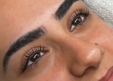 Close-up of meticulously groomed eyebrows and lashes at Plan B Beauty, Broadford, Victoria, AU.