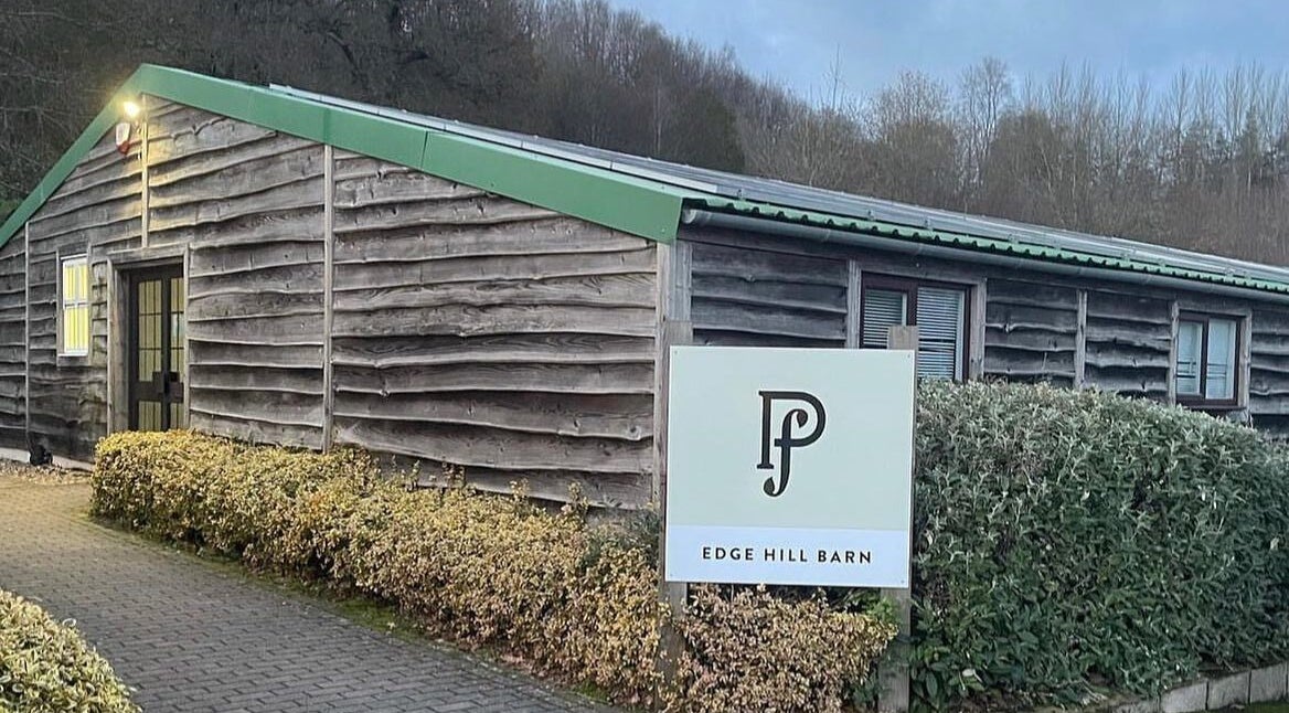 Cozy rustic building of Glow Beauty, Redhill, England, GB, offering a serene beauty and wellness environment.