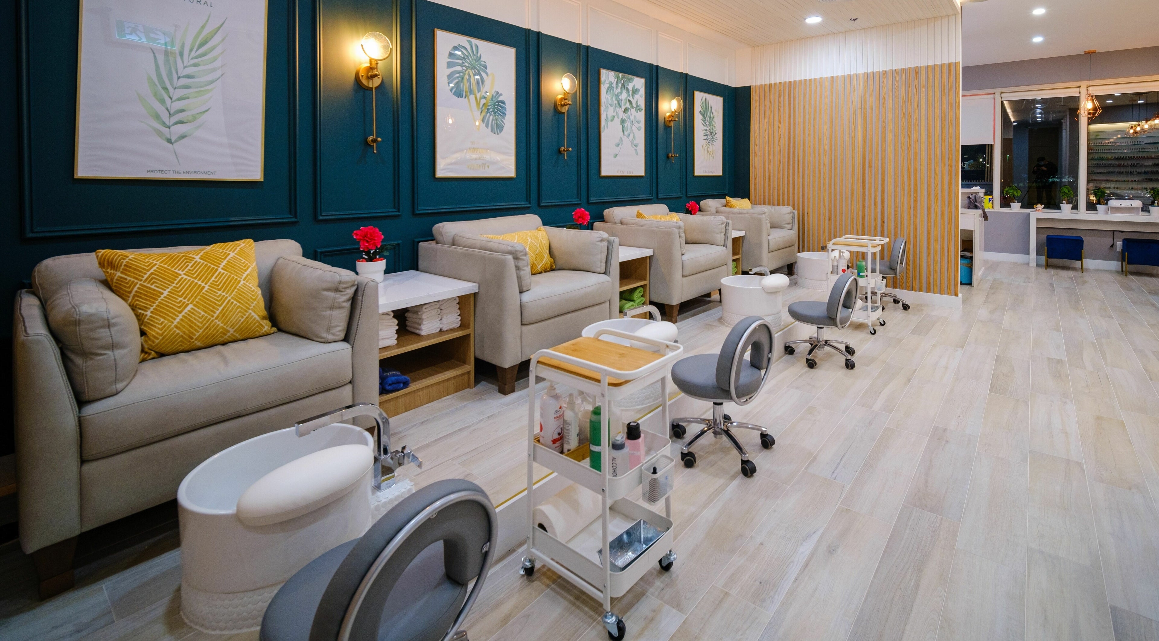 Luxurious pedicure area at One23 Beauty Bar, Vaughan, Ontario, CA featuring plush chairs and serene ambiance.
