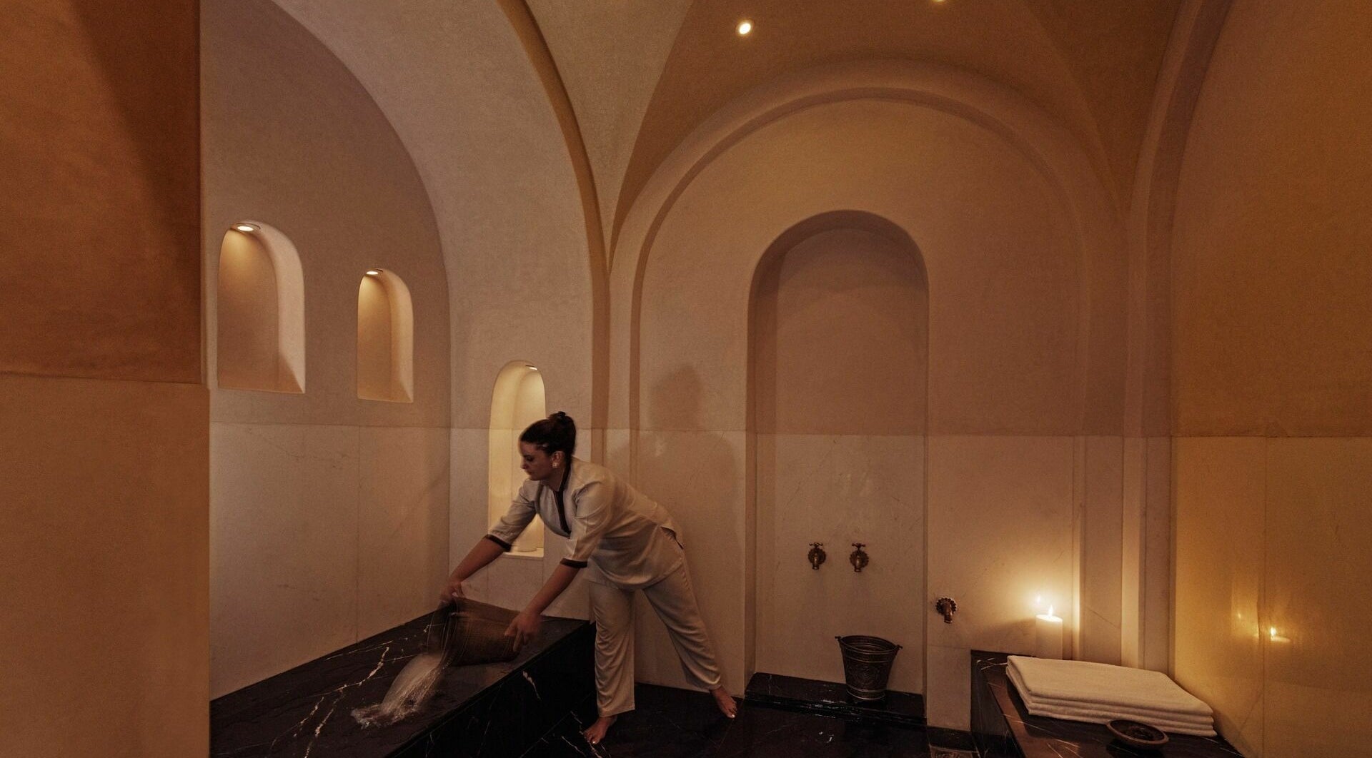 Hammam room at Farnatchi Spa, Marrakesh, Marrakesh-Safi, MA, highlighting elegant arches and serene atmosphere.