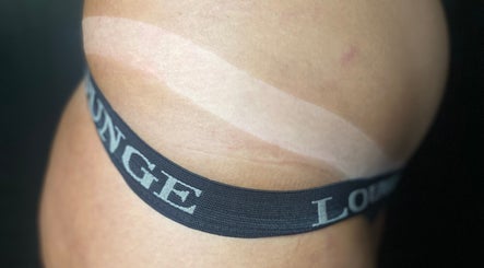 Close-up of a tan line from Bronze Bar Tanning in Tranent, Scotland, GB, showcasing tanning results.
