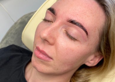 Relaxed client with perfect brows at Bronze Bar Tanning, Tranent, Scotland, GB.