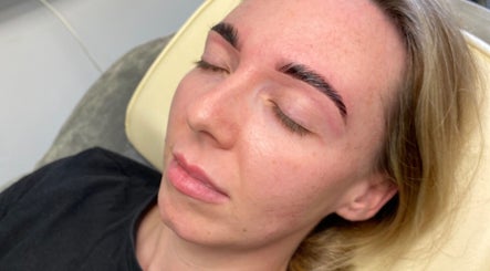 Relaxed client with perfect brows at Bronze Bar Tanning, Tranent, Scotland, GB.