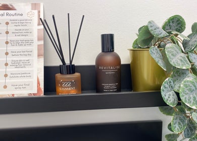 Bronze Bar Tanning's bridal routine display with essential oils and plant in Tranent, Scotland, GB.
