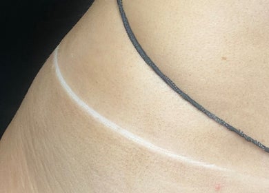 Close-up of a tanning line at Bronze Bar Tanning, Tranent, Scotland, GB, showcasing flawless tanning results.