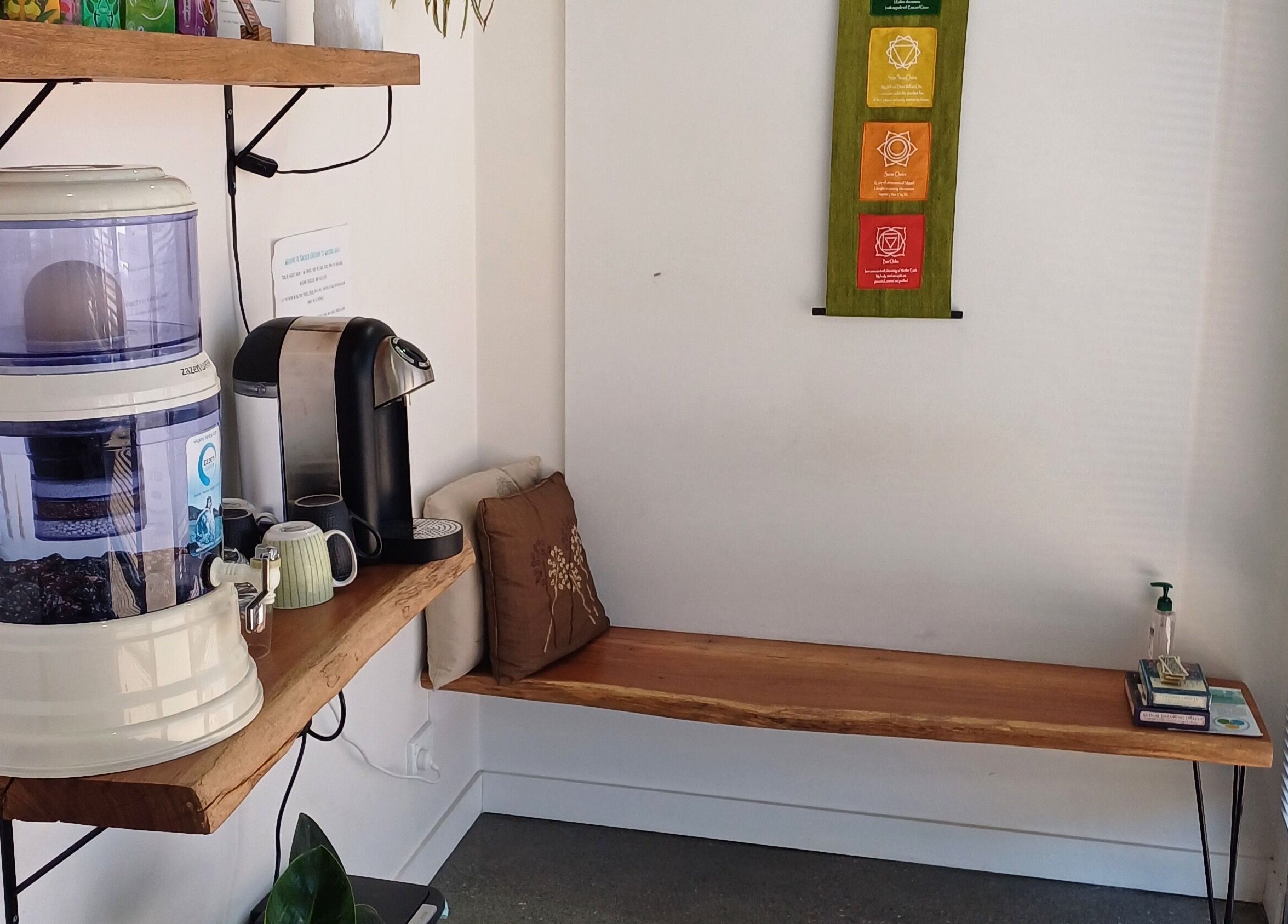 Cozy refreshment nook with water purifier at Sacred Ground Australia, Palm Beach, Queensland, AU.