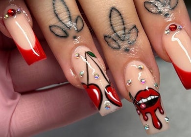 Vibrant cherry-themed nail art at The Beaut-E Club, Glasgow, Scotland, GB.
