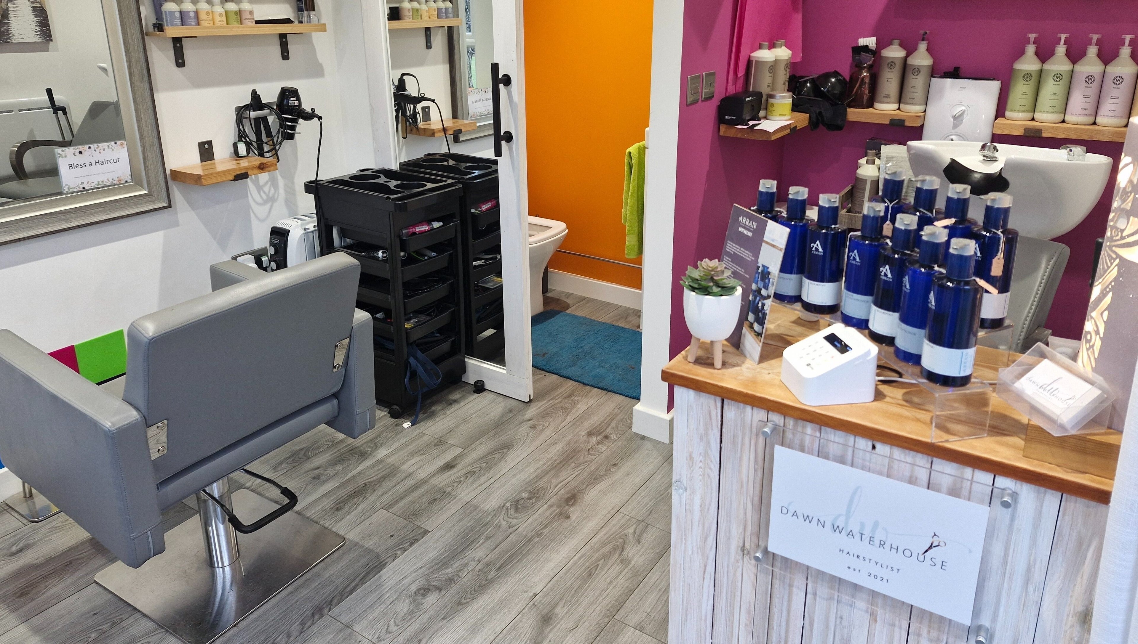 Stylish interior of Dawn Waterhouse Salon in Skipton, England, GB featuring modern hairdressing station.