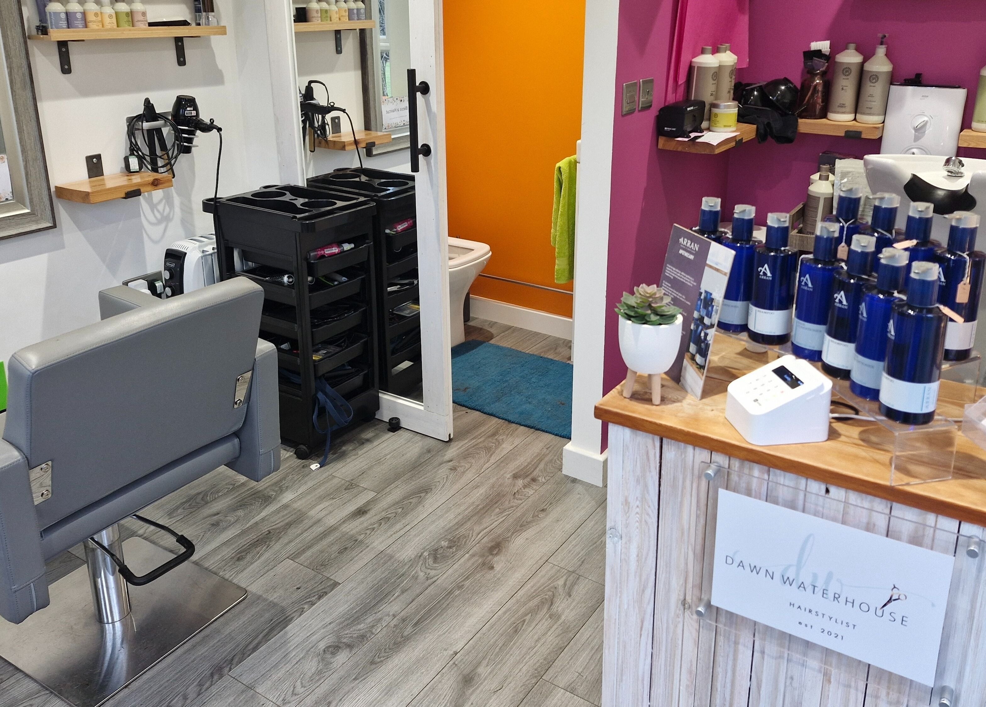 Stylish interior of Dawn Waterhouse Salon in Skipton, England, GB featuring modern hairdressing station.