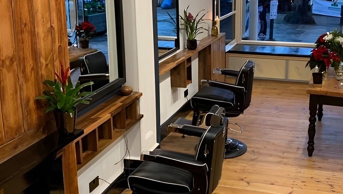 Stylish salon chairs and decor in TAW, Tunbridge Wells, England, GB provide a cozy atmosphere.