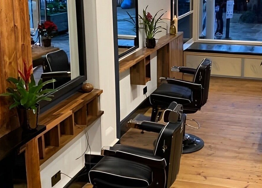 Stylish salon chairs and decor in TAW, Tunbridge Wells, England, GB provide a cozy atmosphere.
