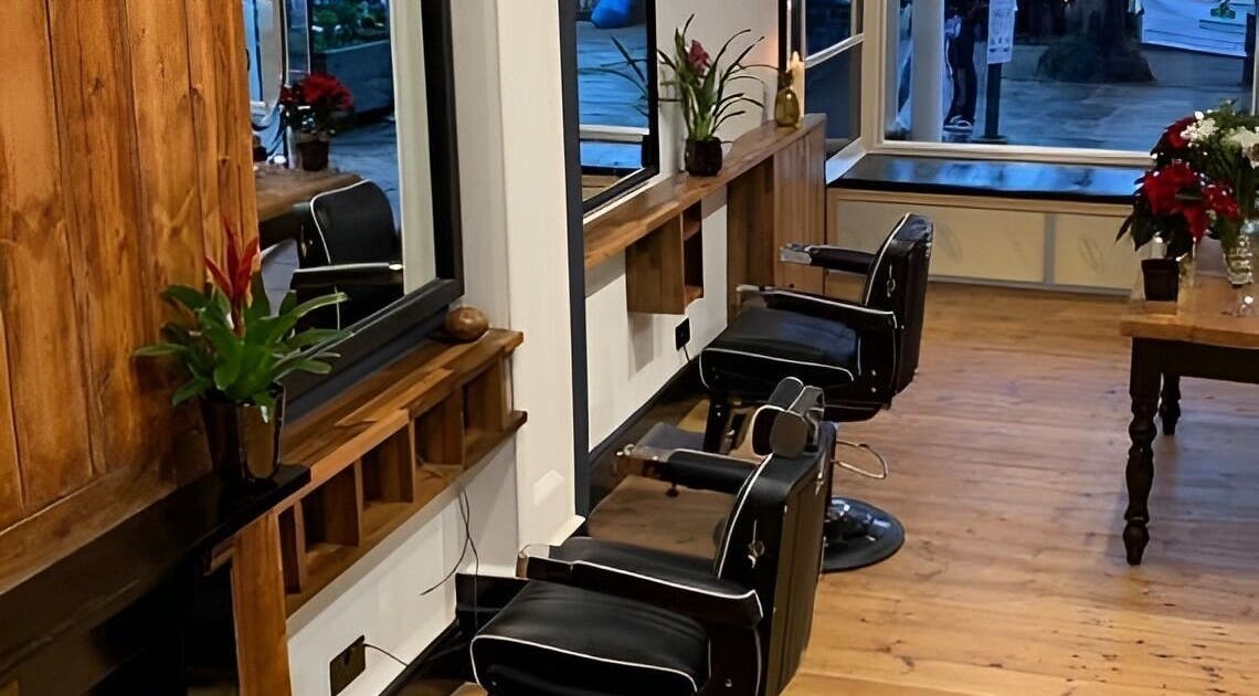 Stylish salon chairs and decor in TAW, Tunbridge Wells, England, GB provide a cozy atmosphere.