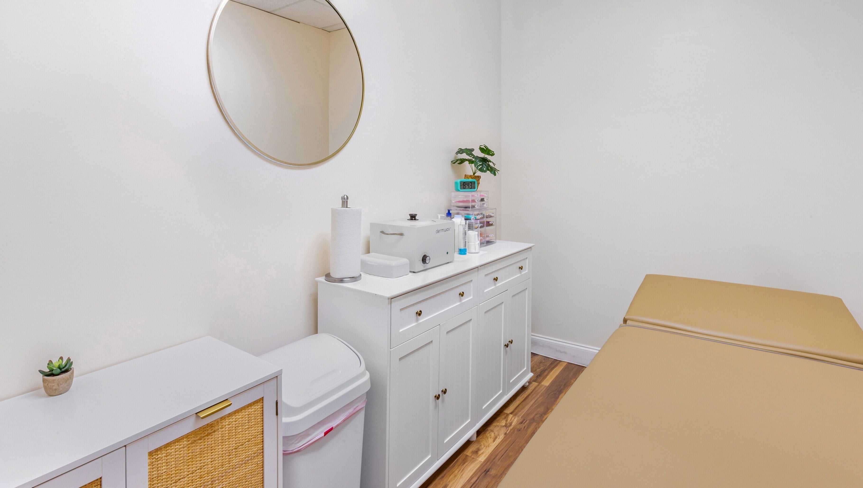 Serene treatment room at Mad Wax in Largo, Florida, US with a massage table and stylish decor.