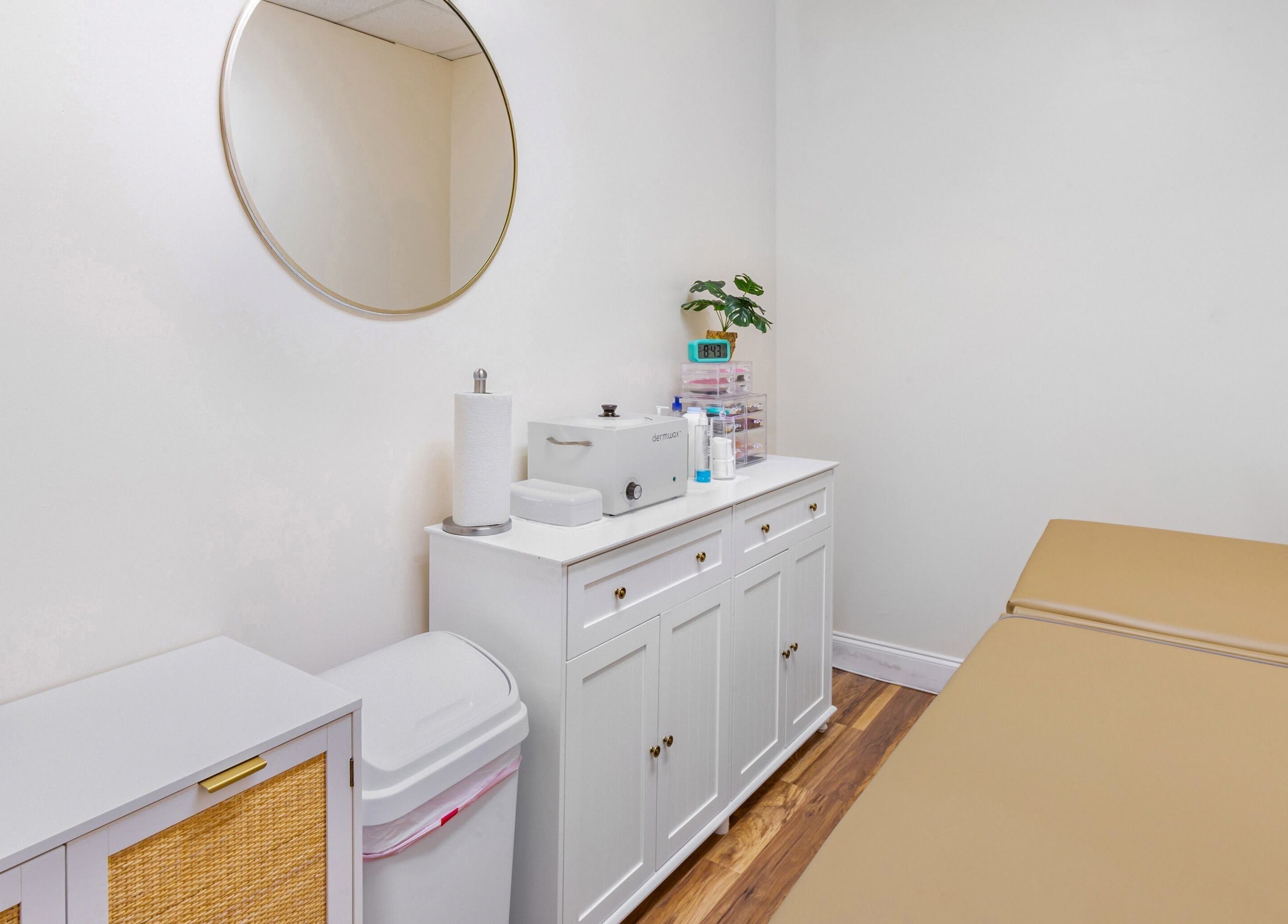 Serene treatment room at Mad Wax in Largo, Florida, US with a massage table and stylish decor.