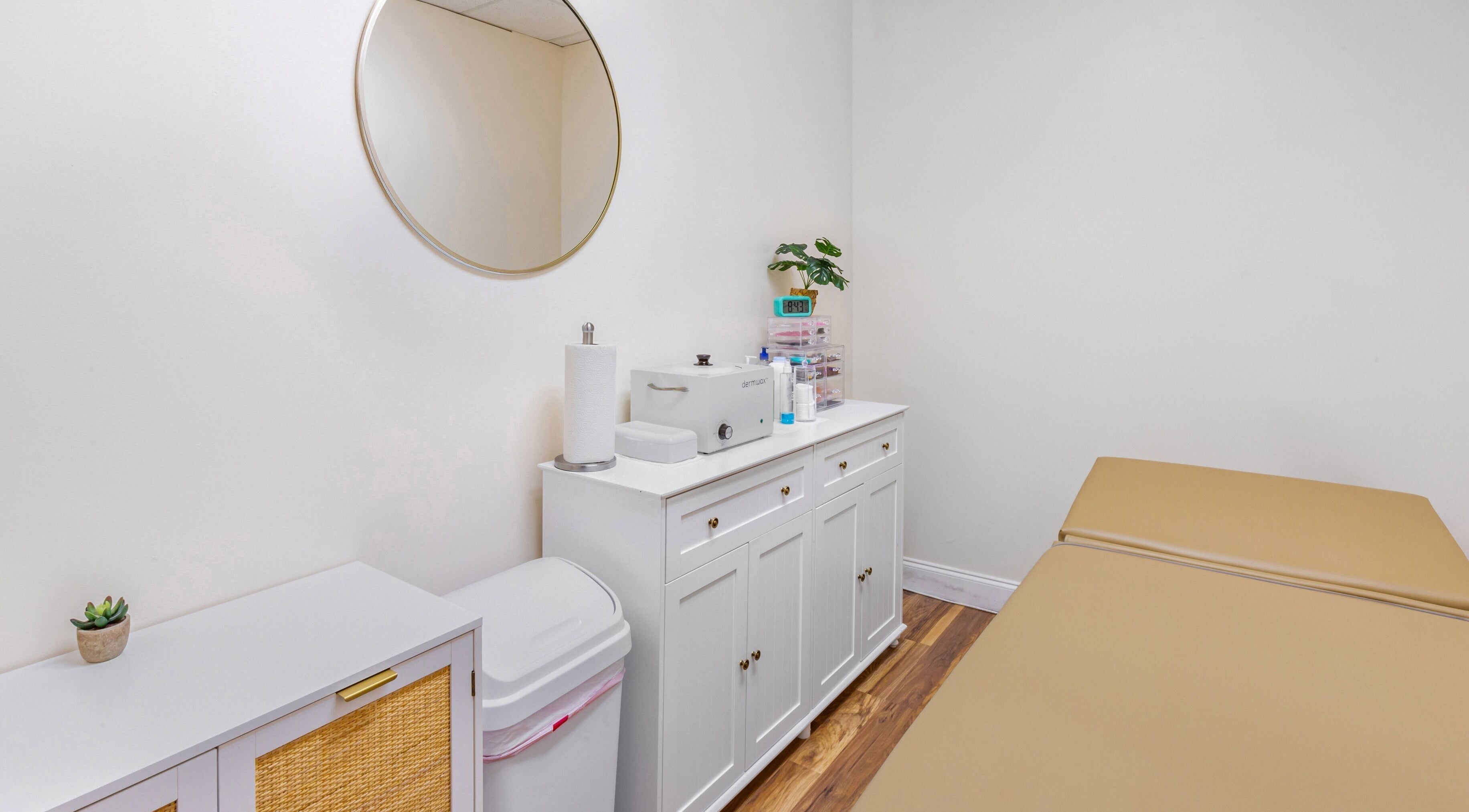 Serene treatment room at Mad Wax in Largo, Florida, US with a massage table and stylish decor.