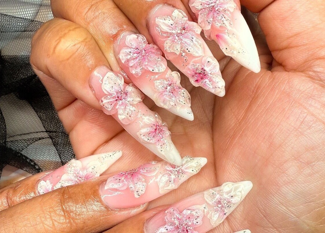 Elegant floral acrylic nails with intricate designs at Thitty Lashes in Moi, Rogaland, NO.