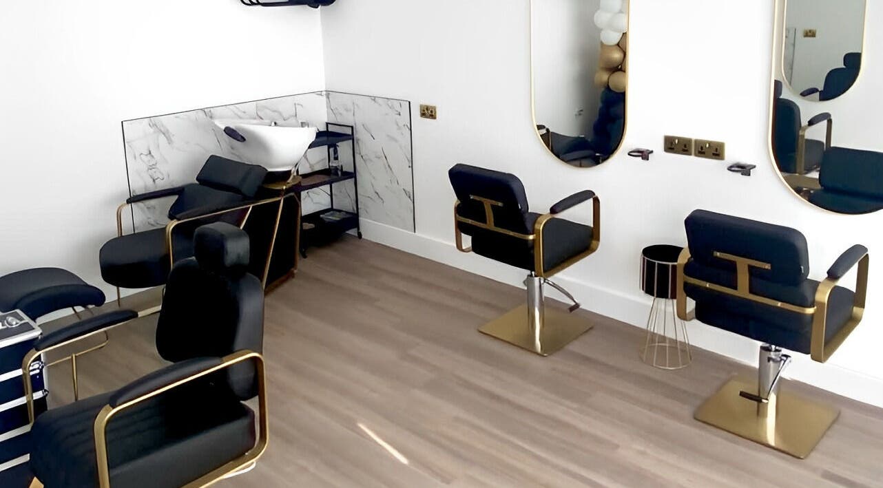 Chic salon interior at Perfectly Pampered, Borrowash, England, GB featuring stylish chairs and wash station.