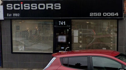 Street view of Pampered Beauties entrance in Sheffield, England, GB showcasing modern design.