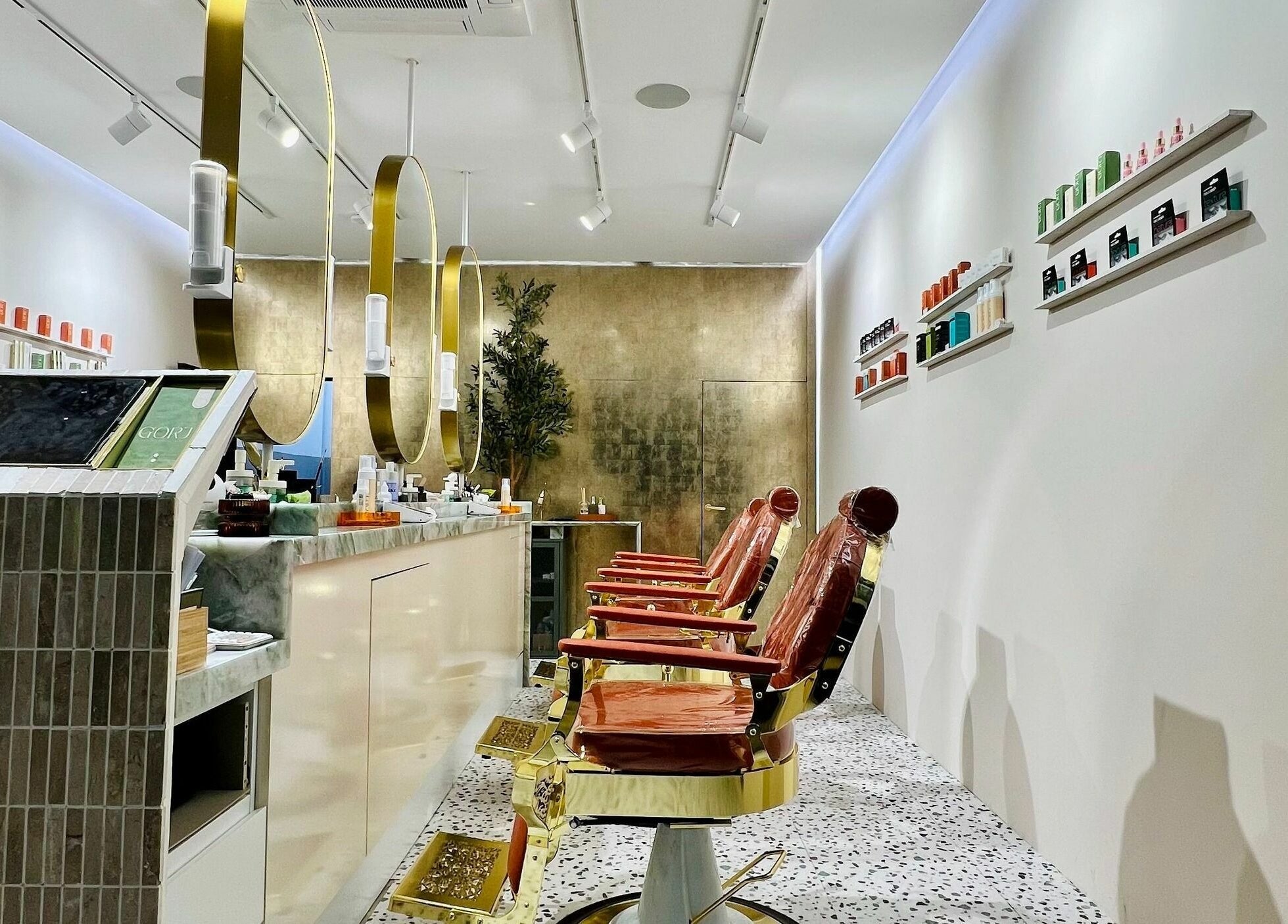 Sleek interior of Gorj Brows Beauty - Strood in Rochester, England, featuring luxurious salon chairs and modern decor.