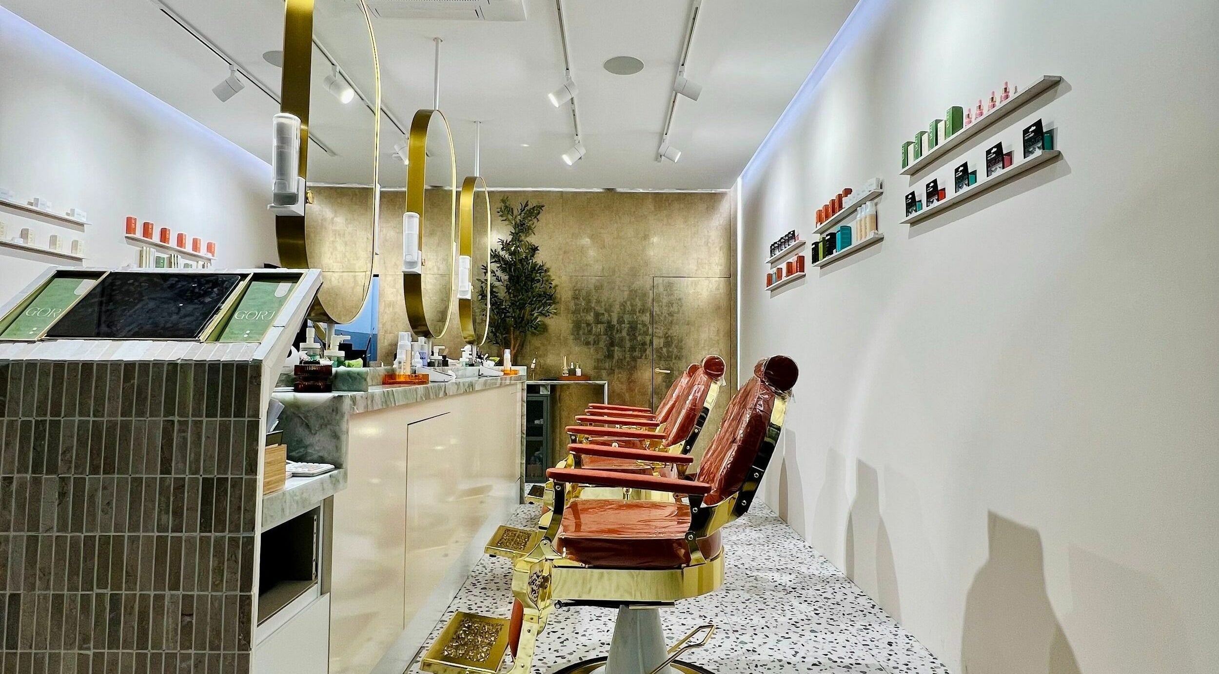 Sleek interior of Gorj Brows Beauty - Strood in Rochester, England, featuring luxurious salon chairs and modern decor.
