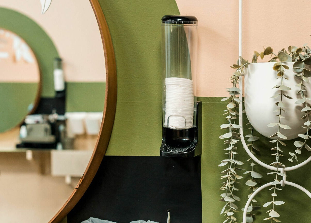 Stylish interior of Gorj Brows Beauty - Strood in Rochester, England, GB featuring modern decor and lush greenery.