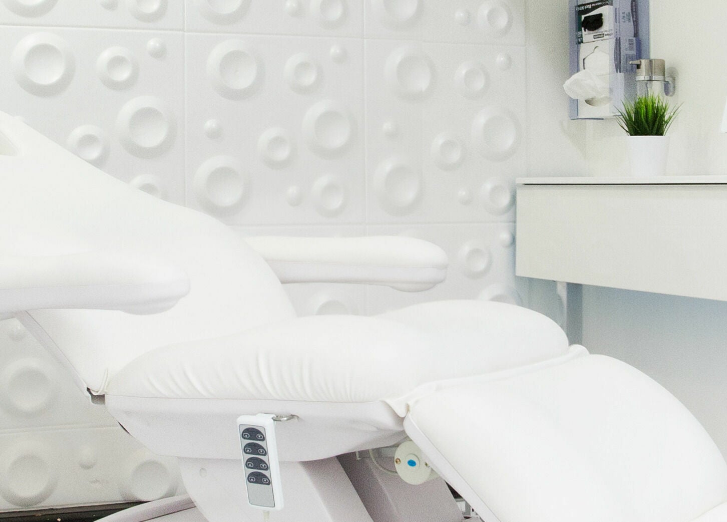 Luxurious white treatment chair at Gorj Brows Beauty - Strood, Rochester, England, GB for ultimate relaxation.