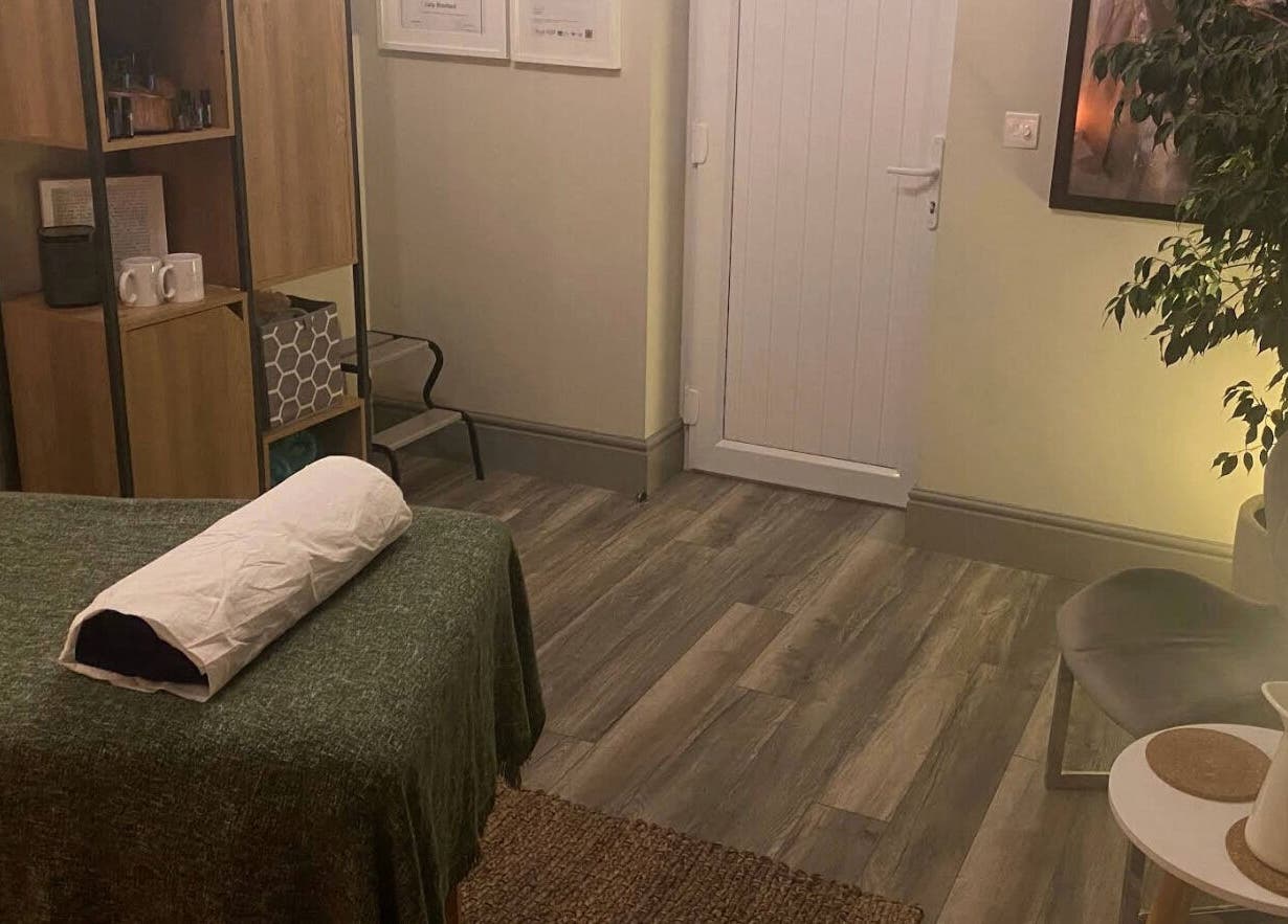 Cozy therapy room at Albion Massage Therapy, Cambridge, England, GB, featuring a massage table and relaxing decor.