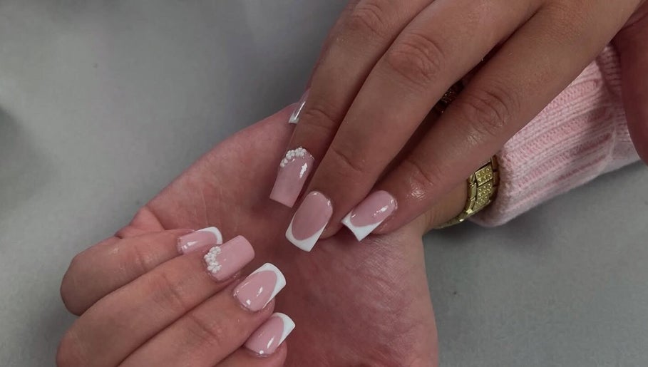 Elegant French manicure with pearl accents at HumS Beauty Clinic (Mosgiel), Mosgiel, Otago Region, NZ.