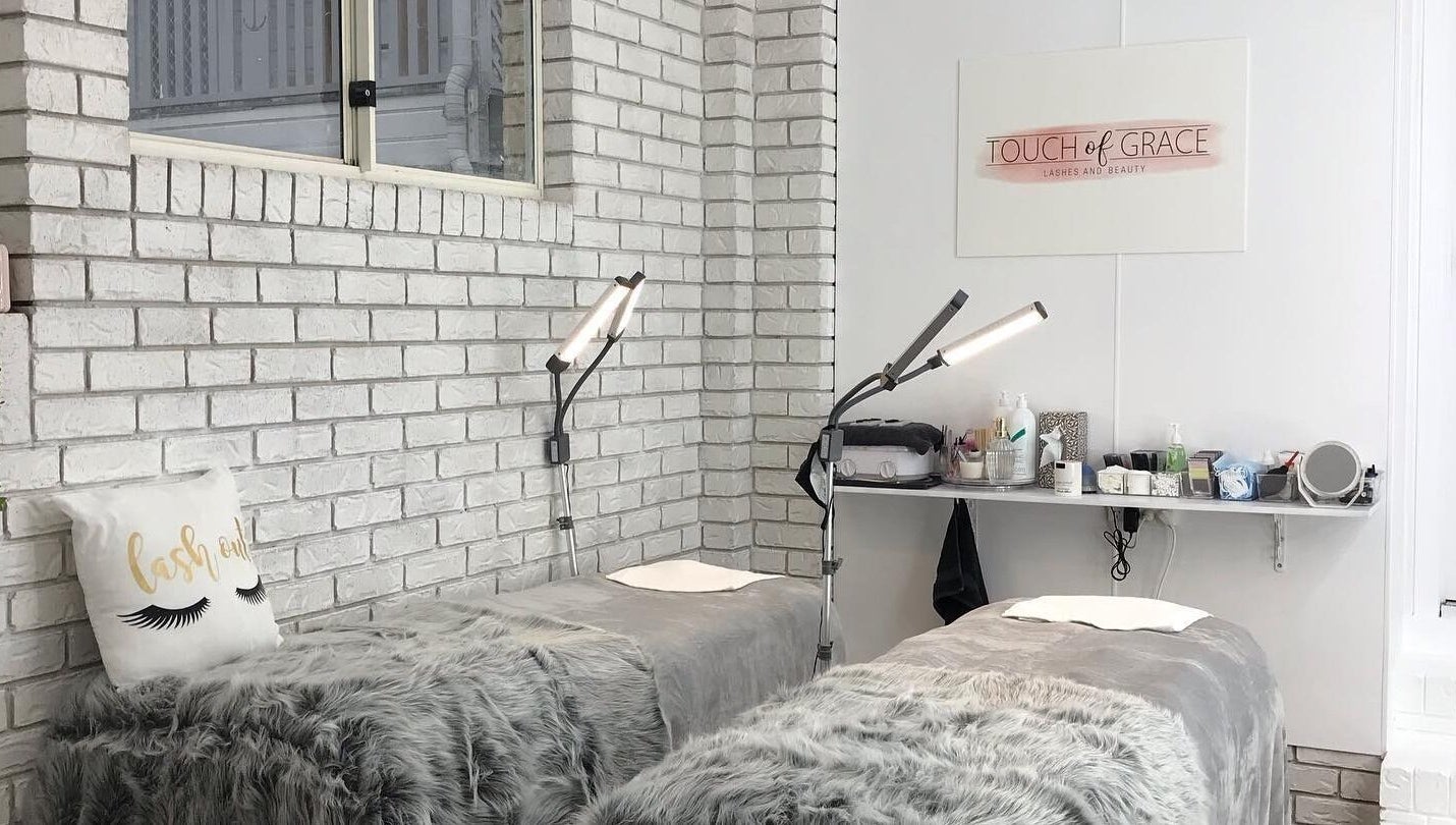 Serene lash treatment beds at Touch of Grace Lashes and Beauty, Lota, Queensland, AU, with soft decor.