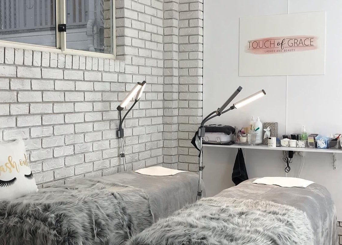 Serene lash treatment beds at Touch of Grace Lashes and Beauty, Lota, Queensland, AU, with soft decor.