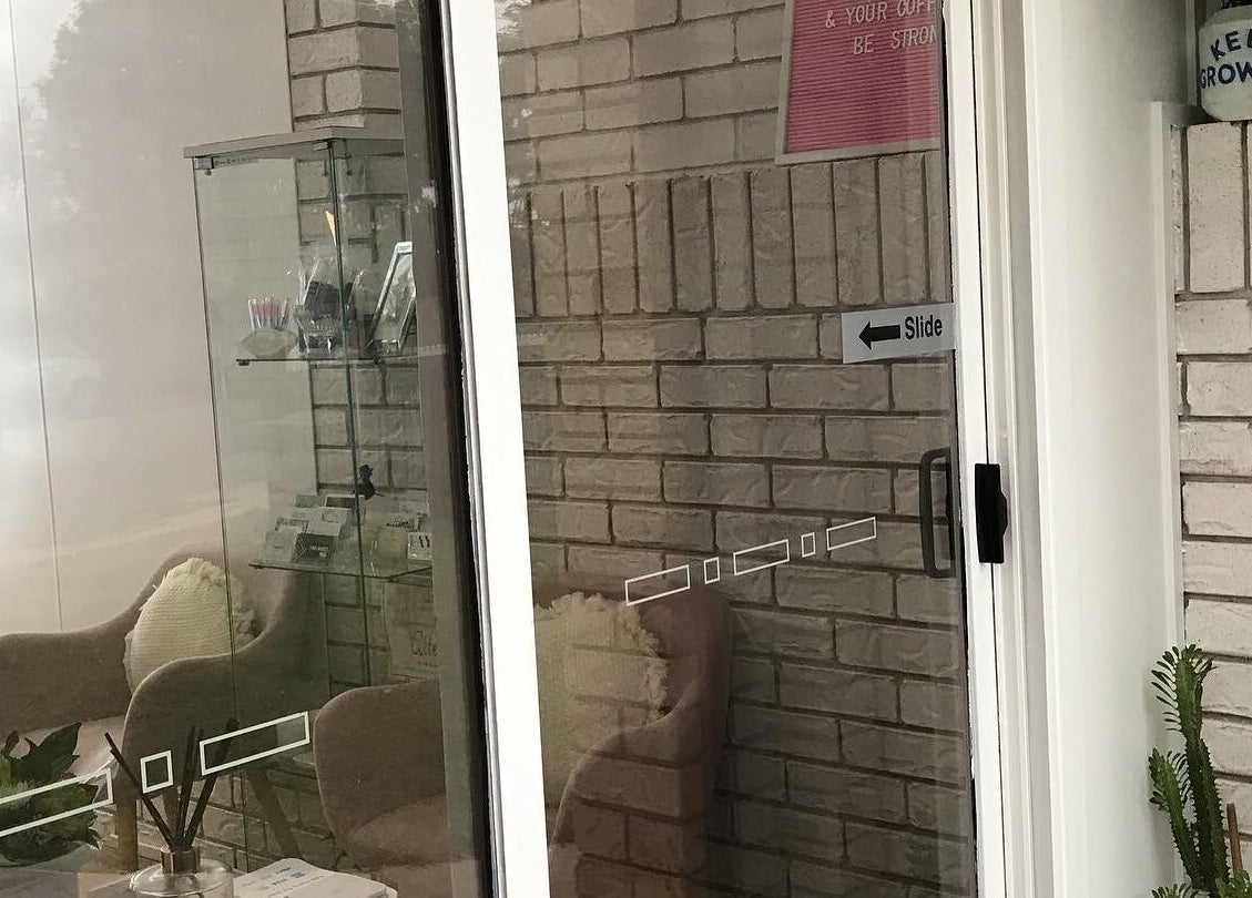 Inviting entry at Touch of Grace Lashes and Beauty, Lota, Queensland, AU with brick decor and seating.