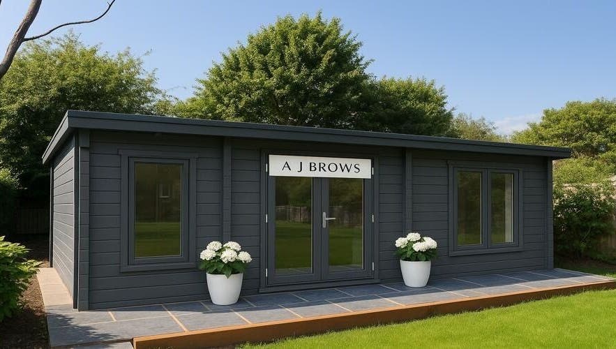 Charming exterior of A J BROWS - SURREY, nestled in Godalming, England, GB among lush greenery.